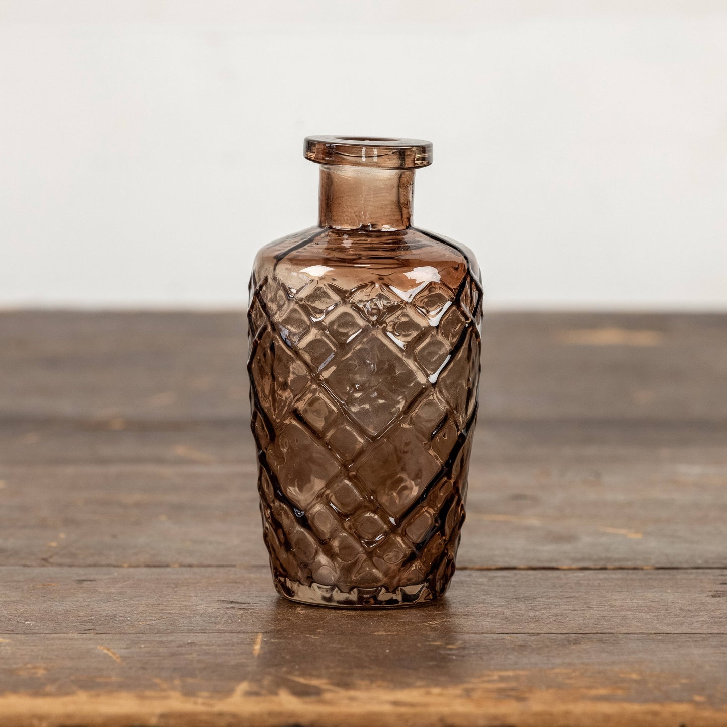 AMBER PATTERNED GLASS BUD VASE